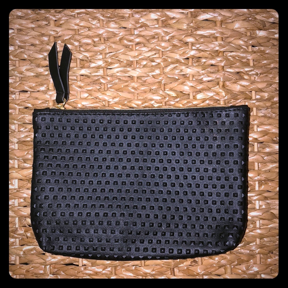 Black IPSY makeup bag with gold zipper